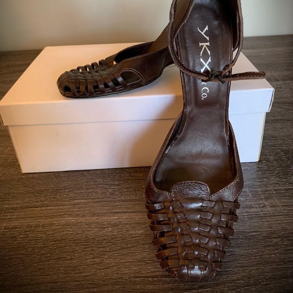 Ladies dark brown 3.5” wedge, good condition, made in Italy.